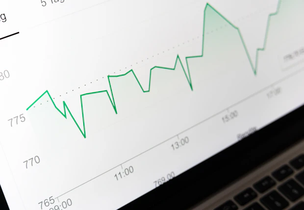 Line chart on a laptop screen.