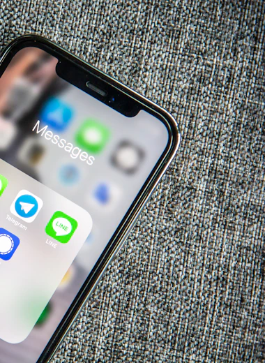 Phone with messaging apps open.